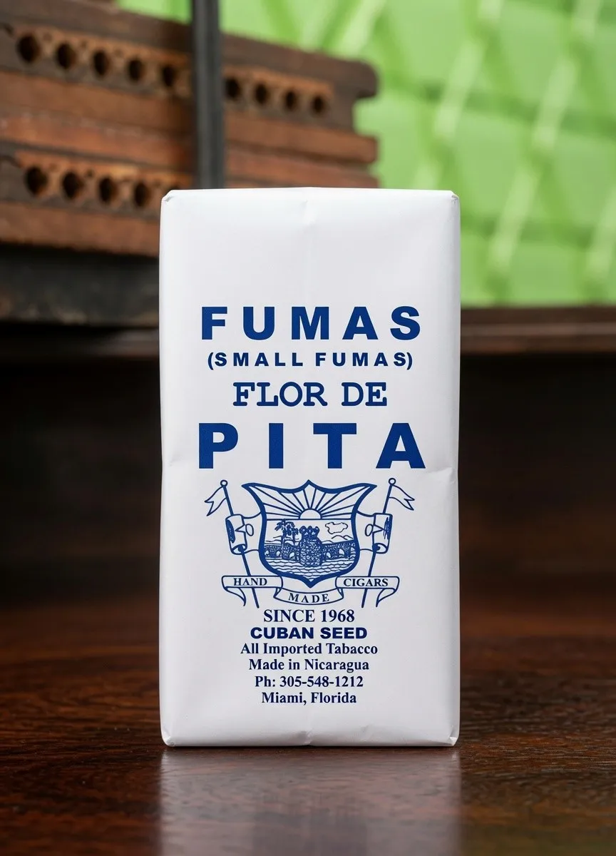 Small Fumas Flor de Pita bundle of 25, paper-wrapped with the label reading Cuban Seed, all imported tobacco, made in Nicaragua